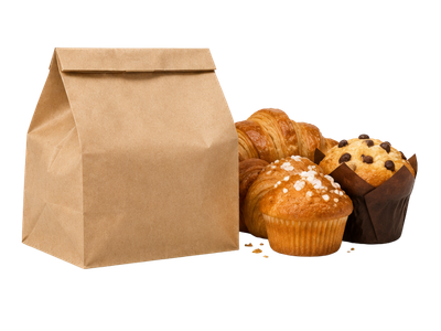 Bolsa de papel con bollería al lado